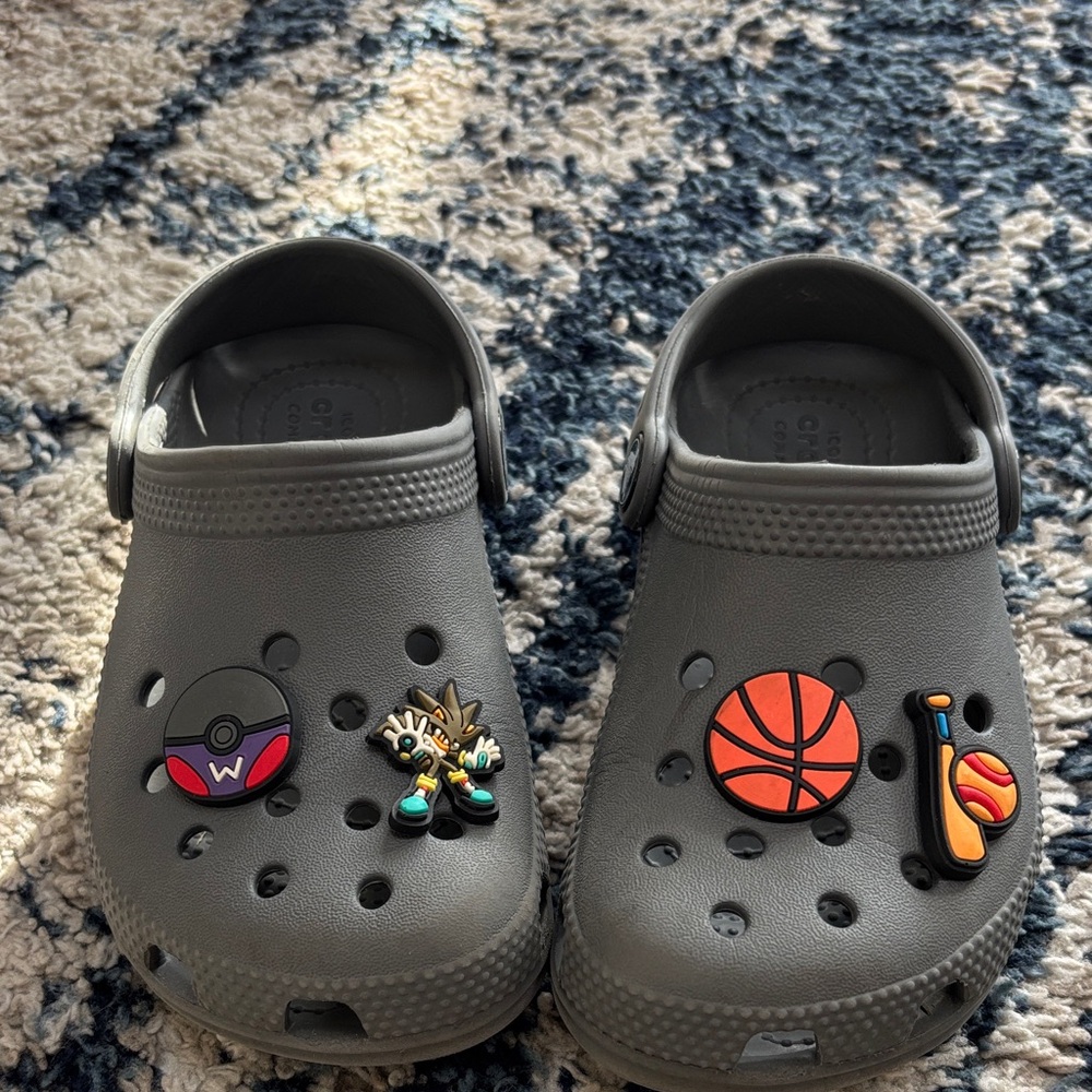 Crocs new condition with charms size 11 toddler